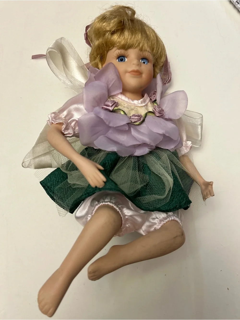 Vintage Porcelain Doll with Pink Outfit and Green Tulle Skirt